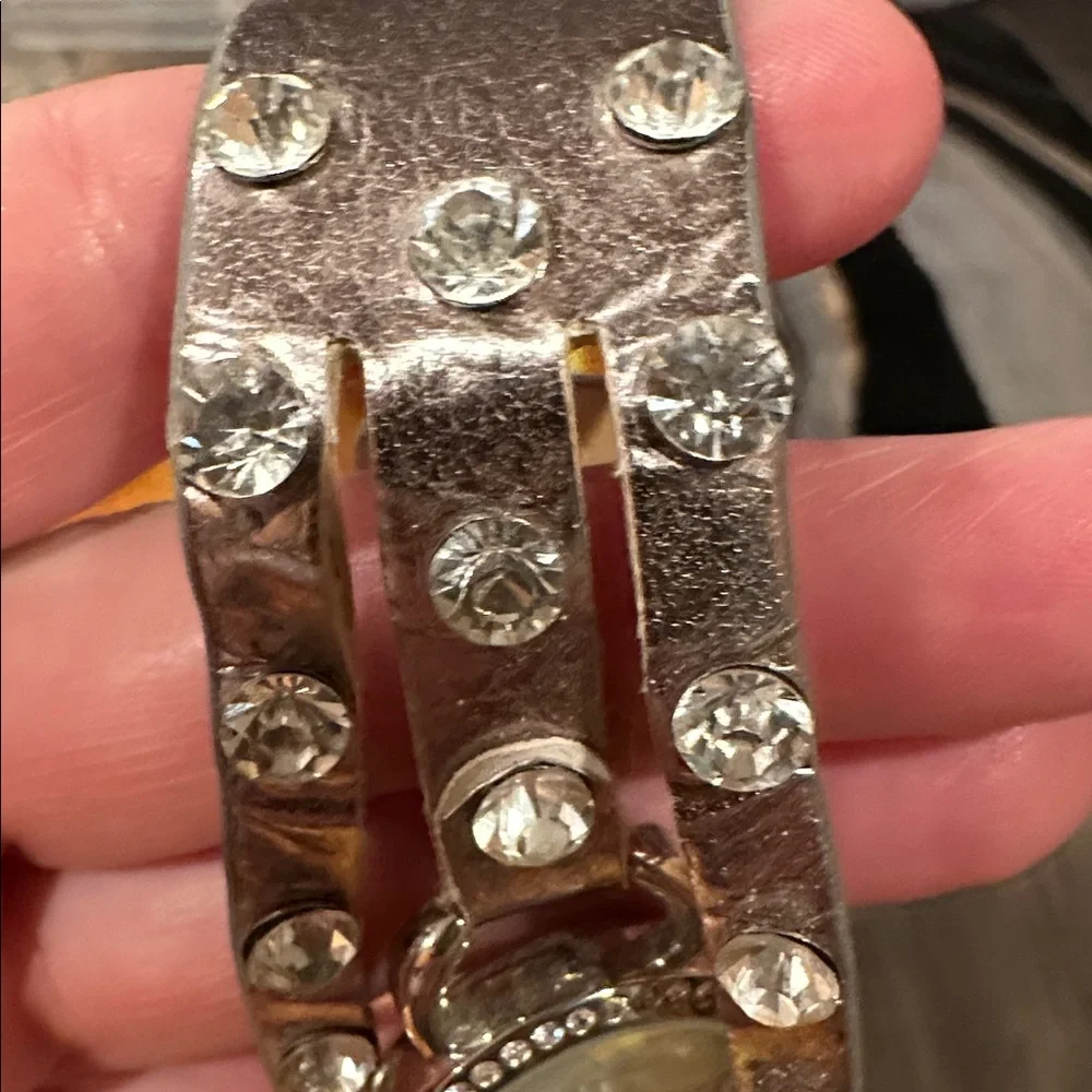 Silver Quartz Watch with Crystal Accents and MOP face. Snap closure
